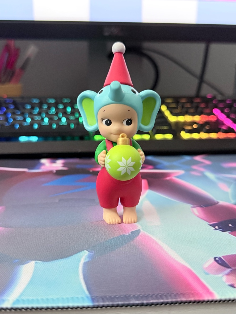 Baby Doll in Pink Elephant Outfit with Teal Hood